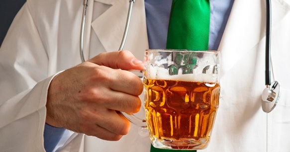 Doctor is drinking beer